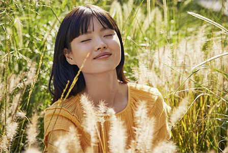 Lifestyle Visual of a woman taking a sunbath